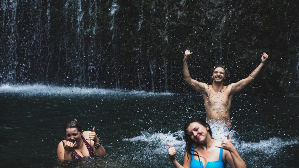 Family with young children enjoying a safe waterfall outing in Igatpuri monsoon
