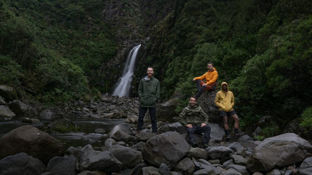 Parents and young children enjoying safe views of Bhavali waterfall in Igatpuri during monsoon