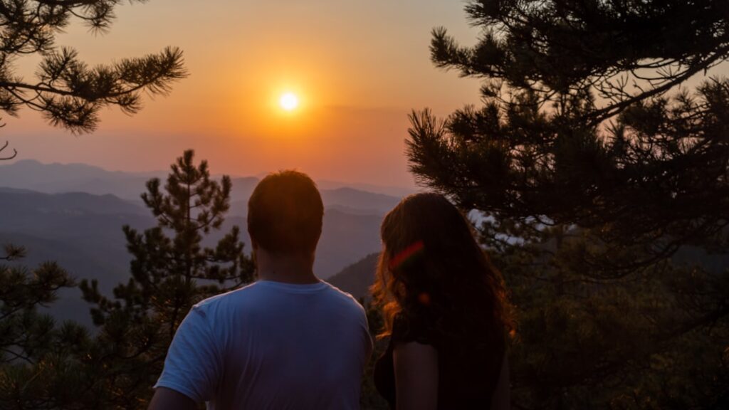 Couple enjoying the sunset at Camel Valley Igatpuri