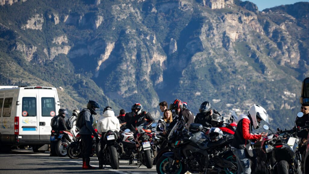 Riding club motorcycles lined up at a scenic Sahyadri mountain overlook near Igatpuri