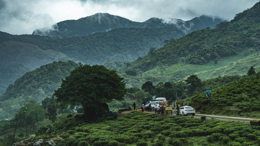 Motorcycle rider navigating the misty curves of Kasara Ghat on the Mumbai to Igatpuri bike ride